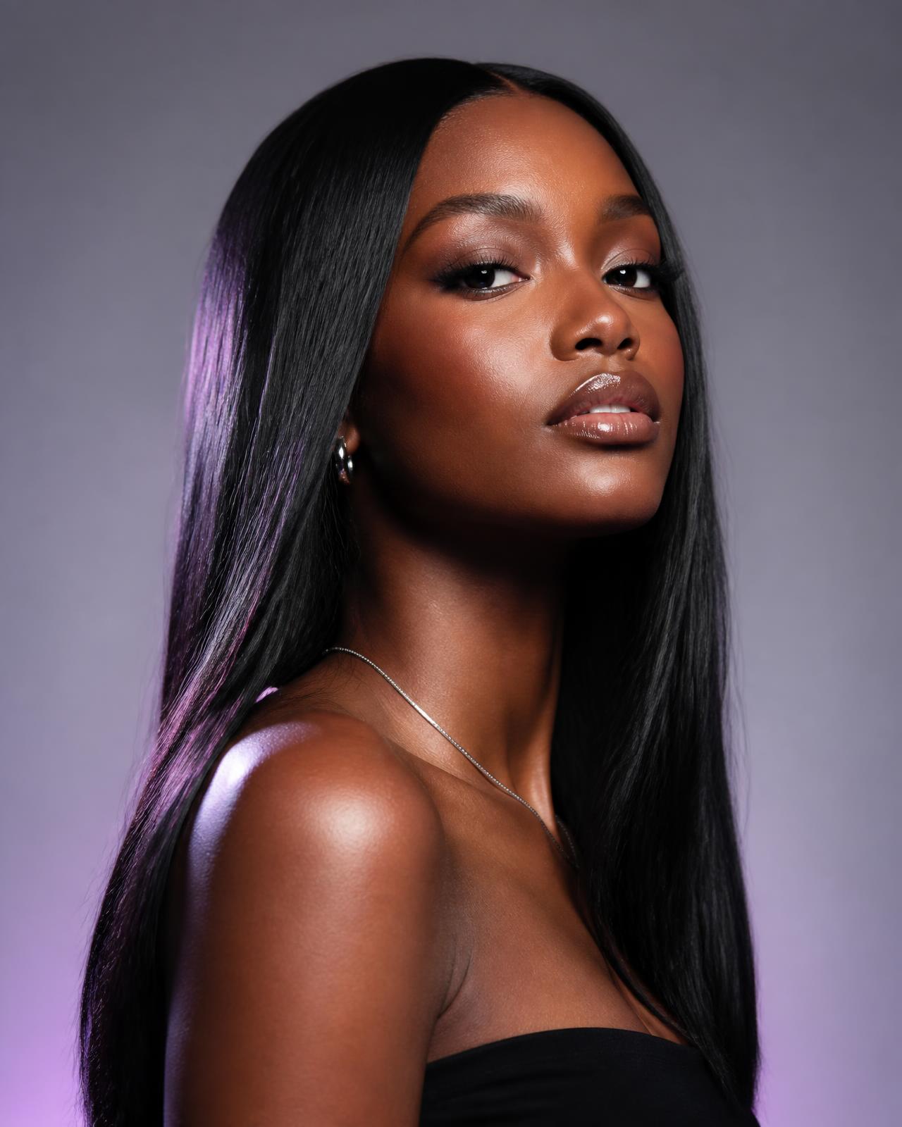 Model wearing a long, sleek premium WigSlays unit